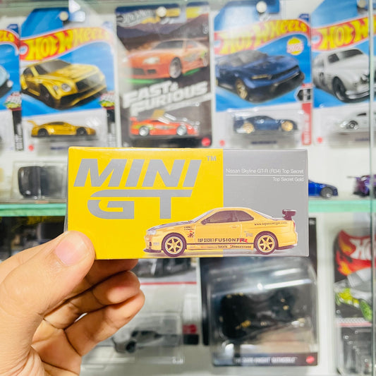 Mini GT, Nissan Skyline GT-R (34) Top Secret Gold